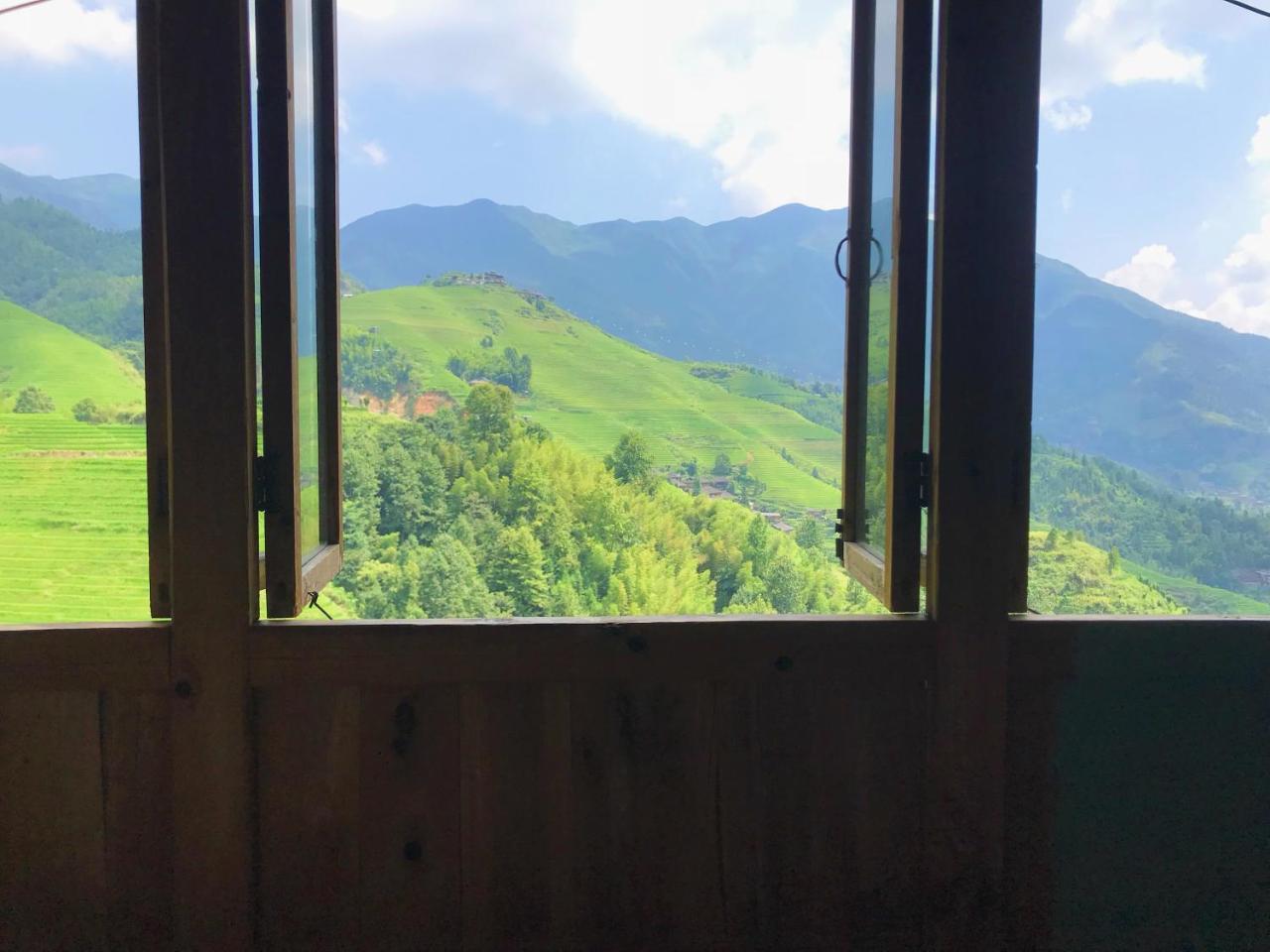 Dragon'S Den Hostel Лонгшенг Екстериор снимка