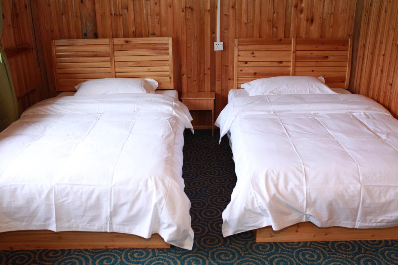 Dragon'S Den Hostel Лонгшенг Екстериор снимка