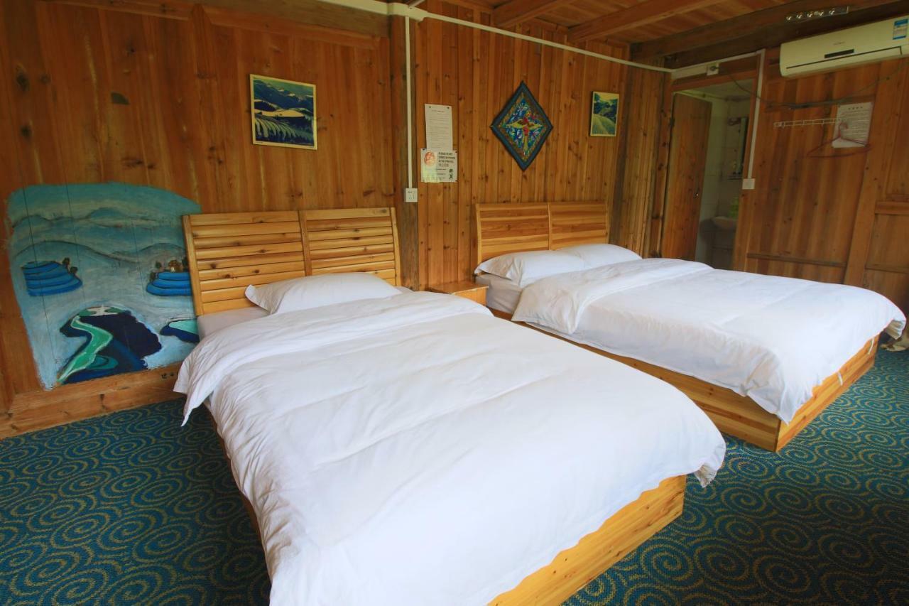 Dragon'S Den Hostel Лонгшенг Екстериор снимка